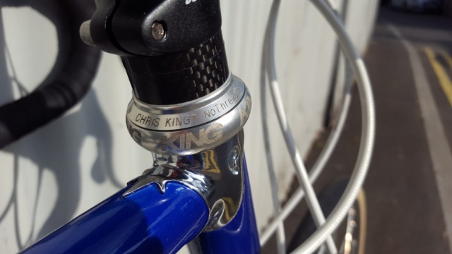 Blue Colnago Tecnos with Chris King head set